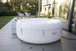 Lay-Z-Spa Paris Hot Tub with Built In LED Light System, 140 AirJet Massage System Inflatable Spa with Freeze Shield Technology, 4-6 Person